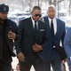 Singer R. Kelly (C) arrives for his court date at the Leighton Courthouse on March 22, 2019 in Chicago, Illinois. R. Kelly appeared before a judge to request permission to travel to Dubai to perform in several concerts.